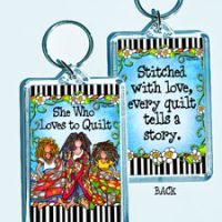 She Who Loves to Quilt – 3″ x 2″ Acrylic (double-sided) Key Chain (Quilt / Fabric)