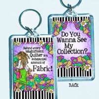 Behind every Magnificent Quilter is a substantial amount of Fabric! – 3″ x 2″ Acrylic (double-sided) Key Chain (Quilt / Fabric)
